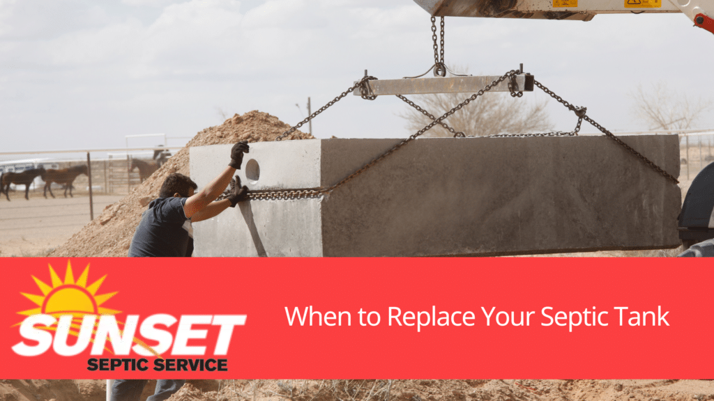 A photo of a man replacing a septic tank to accompany the blog title: When Should You Replace Your Septic Tank