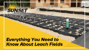 Black text reads "Everything you need to know about leach fields" over a yellow triangle with an image of a leach field